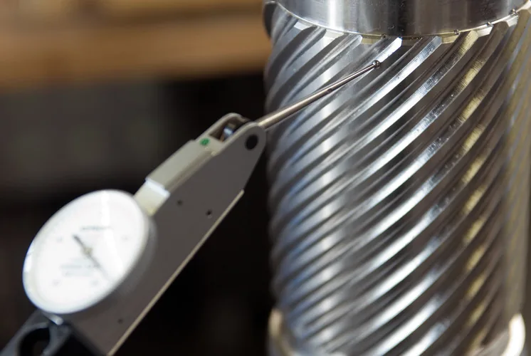 Close-up of spline profile inspection with indicator