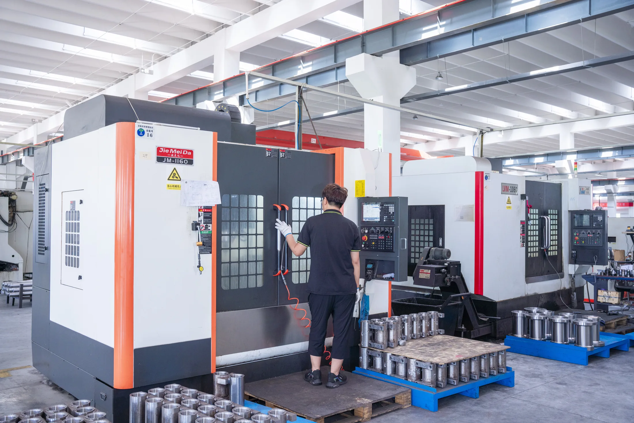 Operator at JM-1160 machining center