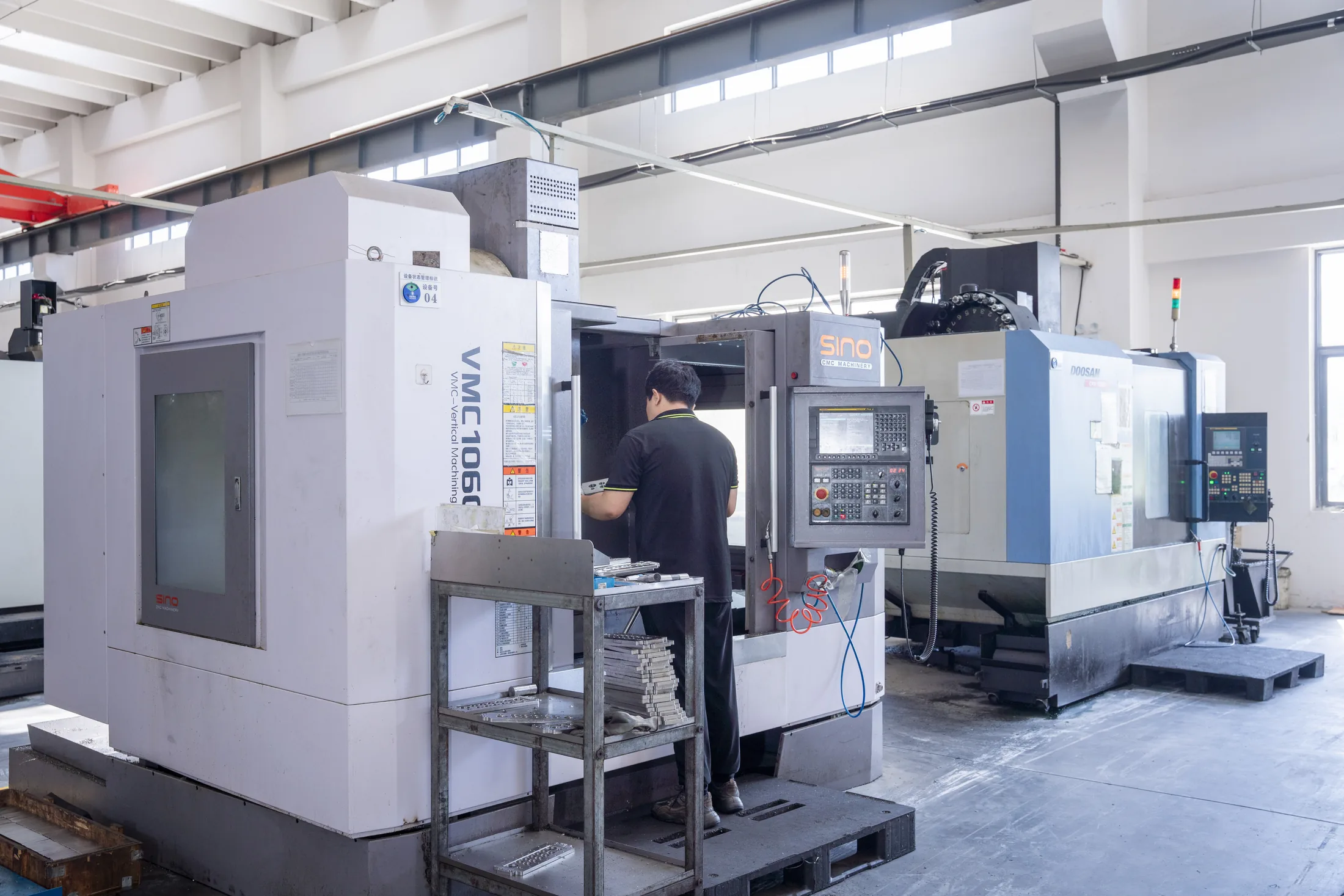 Sino VMC1060 and Doosan machining centers